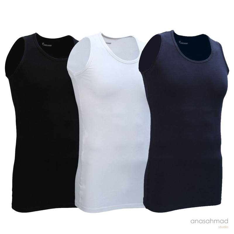 Three tank tops in black, white and navy on mannequin form
