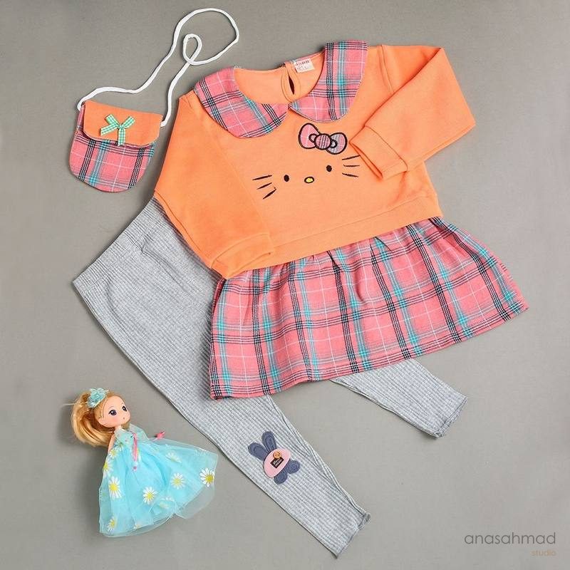 Children's plaid Hello Kitty-style dress set styled with doll and matching bag