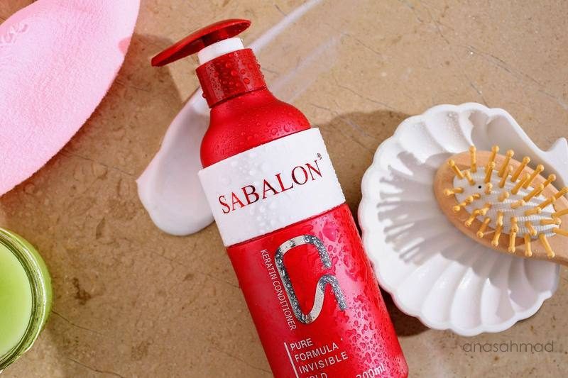 Sabalon keratin conditioner bottle with hairbrush and bath accessories