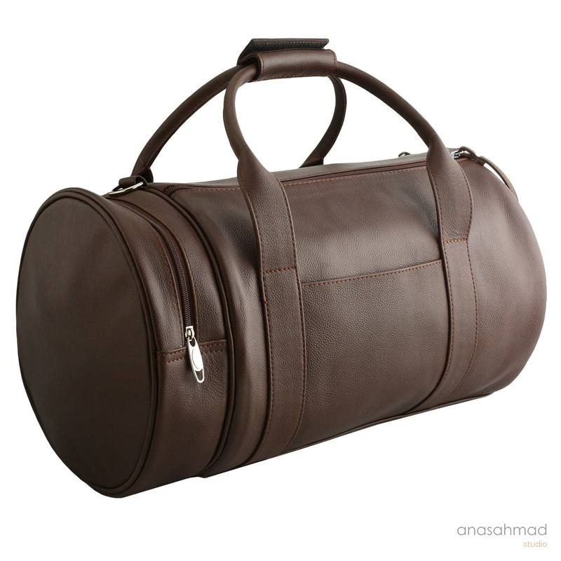 Brown leather cylindrical duffel travel bag