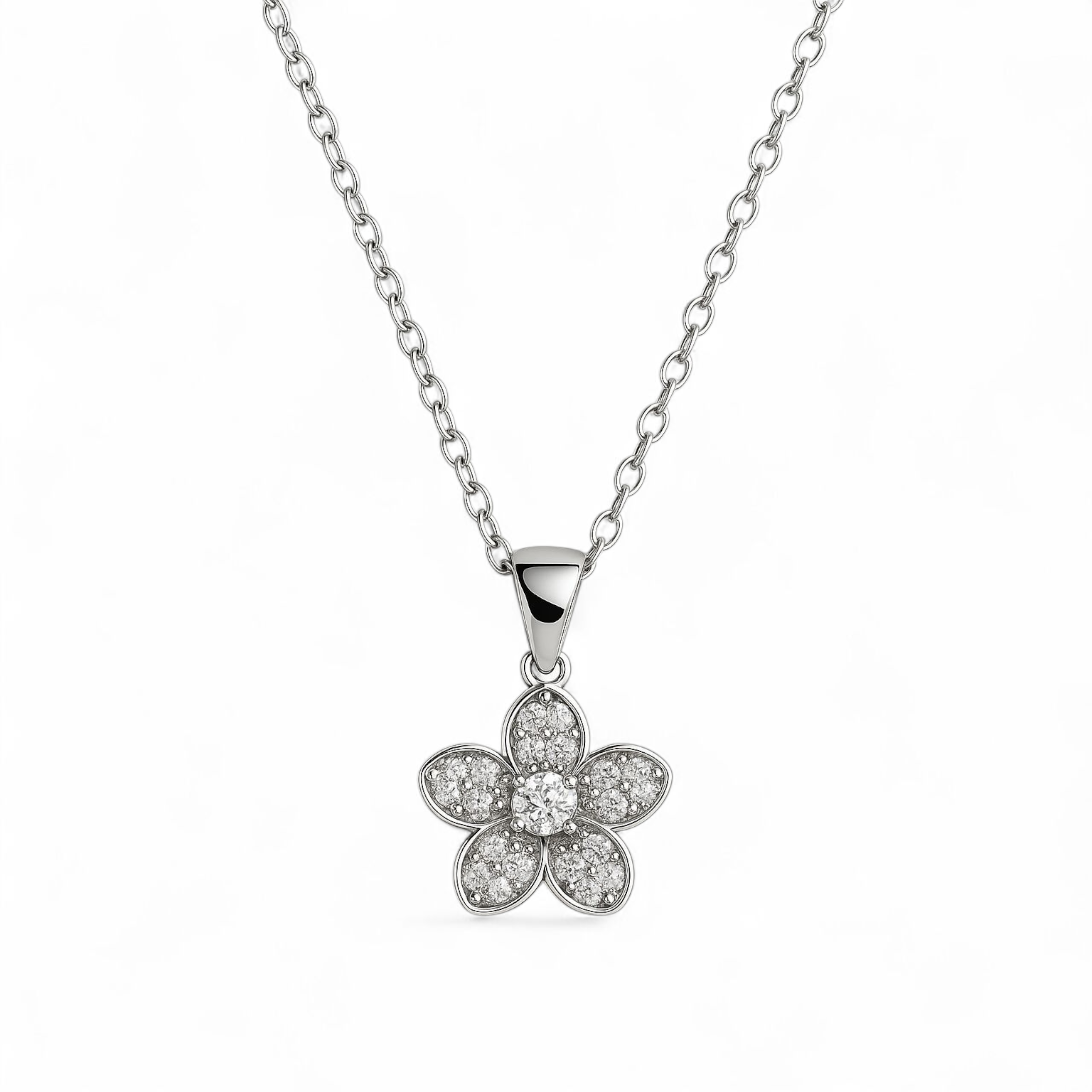 Delicate flower-shaped diamond pendant necklace on silver chain