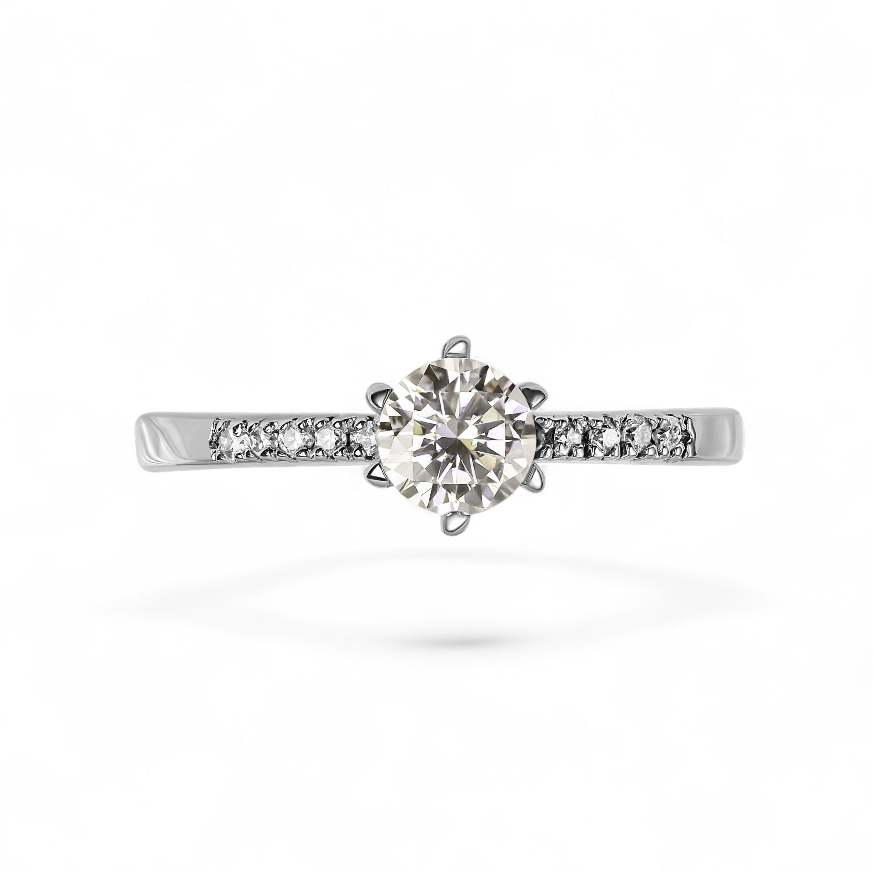 Classic diamond engagement ring with round center stone and slim band